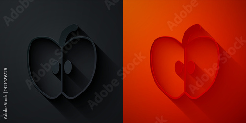 Paper cut Apple icon isolated on black and red background. Fruit with leaf symbol. Paper art style. Vector