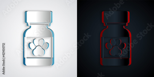 Paper cut Medicine bottle and pills icon isolated on grey and black background. Container with pills. Prescription medicine for animal. Paper art style. Vector
