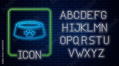 Glowing neon Pet food bowl for cat or dog icon isolated on brick wall background. Dog or cat paw print. Neon light alphabet. Vector