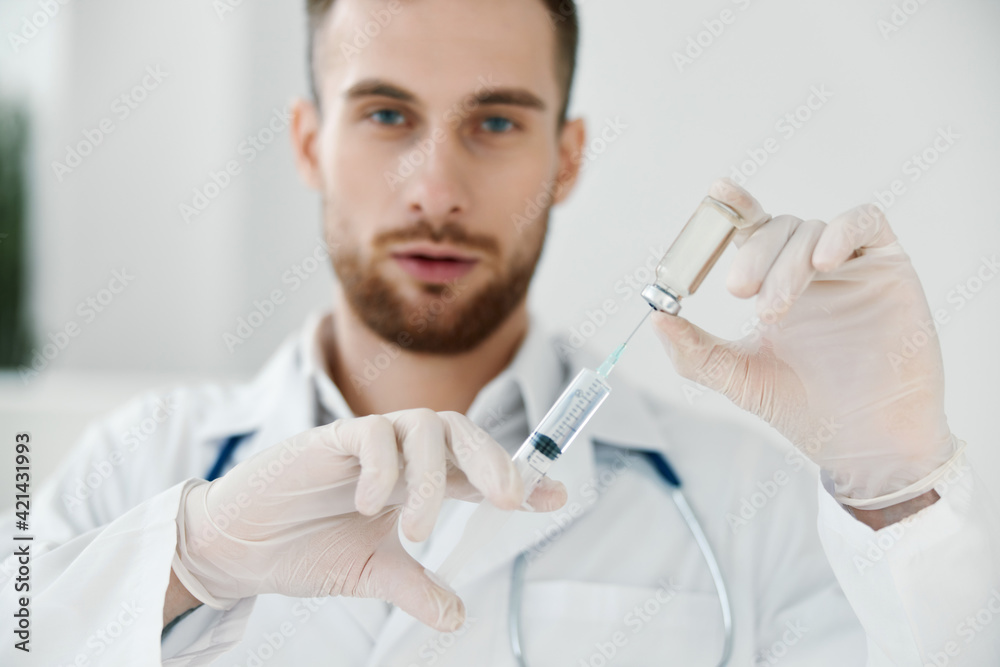 professional doctor in medical gloves syringe injection vaccine liquid laboratory professional doctor in medical gloves syringe injection vaccine liquid laboratory