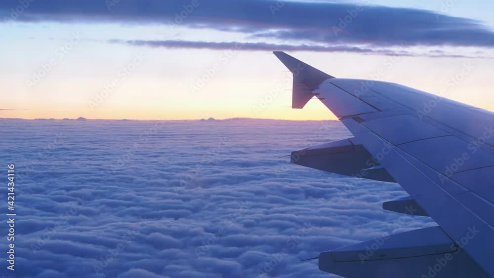 Aerial view above the dark clouds and sky, Inspiration concept. Airliner plane wing view, travel freedom, transport 4k. Passenger airbus flying in clouds, thundercloud, bad rainy weather. Aerial view above the dark clouds and sky, Inspiration concept. Airliner plane wing view, travel freedom, transport 4k. Passenger airbus flying in clouds, thundercloud, bad rainy weather.