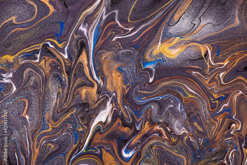 Abstract fluid art background dark purple and orange colors. Liquid marble. Acrylic painting on canvas with golden lines