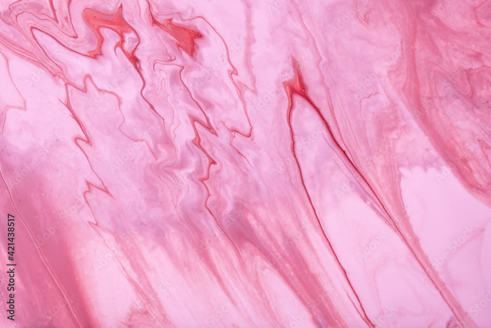 Abstract fluid art background pink and purple colors. Liquid marble. Acrylic painting with lilac gradient and splash.