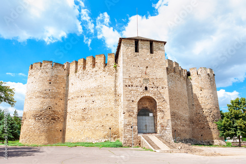 Facade of historic fort in Soroca from Moldova , before restoration . Medieval fortress tourist attraction, Cetatea Soroca photo