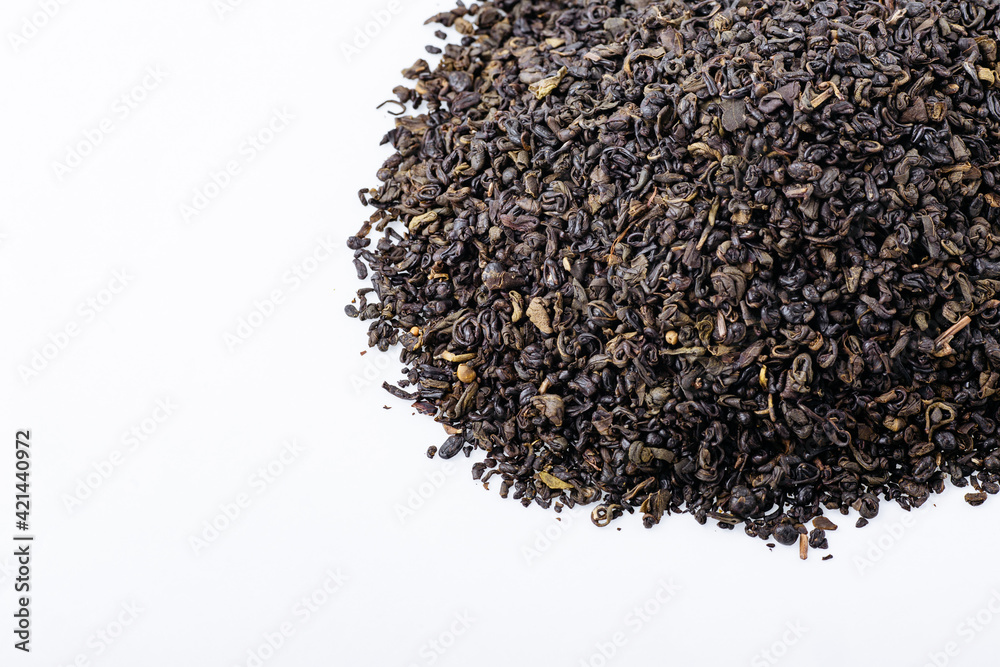 Green tea with jasmine on white background. Top view. Close up. High resolution Green tea with jasmine on white background. Top view. Close up. High resolution