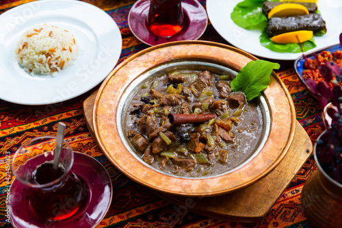 Mutancana, a turkish meal with lamb meat, prunes and vegetables
