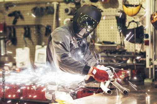 welder at work in a workshop © Andris
