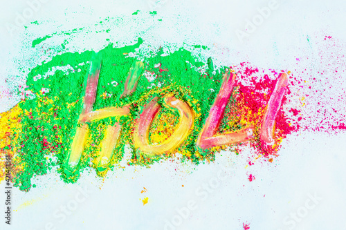 Eco-friendly colorful holi powder or gulal on white background.