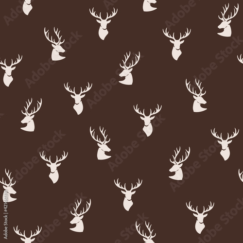 Simple seamless trendy pattern with head of reindeer. Contour design vector print.