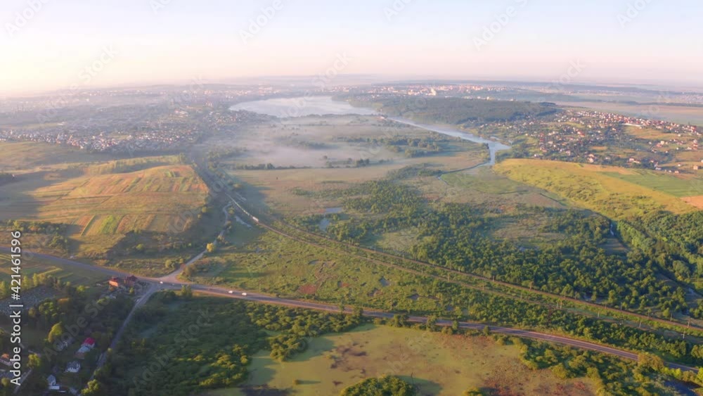 4k drone forward and down video (Ultra High Definition) of misty valley in outskirts of Ternopil town, Ukraine, Europe. Colorful sunrise in Ukrainian countryside... 4k drone forward and down video (Ultra High Definition) of misty valley in outskirts of Ternopil town, Ukraine, Europe. Colorful sunrise in Ukrainian countryside...