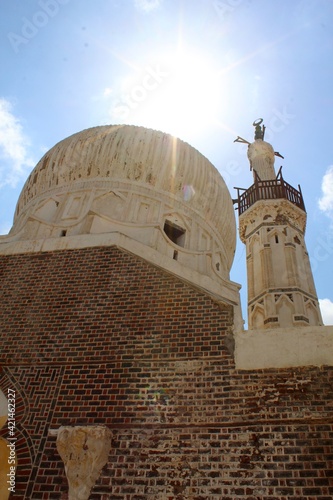 The exterior facade showing the dome and minaret of Abassi mosque in Rashid in Egypt photo