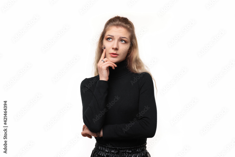 blonde girl with a concentrated look, wondering with a doubtful expression, looking up and to the side, isolated blonde girl with a concentrated look, wondering with a doubtful expression, looking up and to the side, isolated