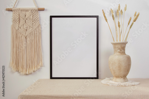 Black photo frame mockup with macrame