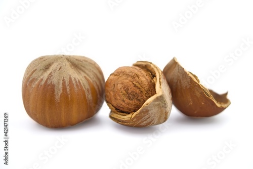 Macro view of whole ripe hazelnuts
