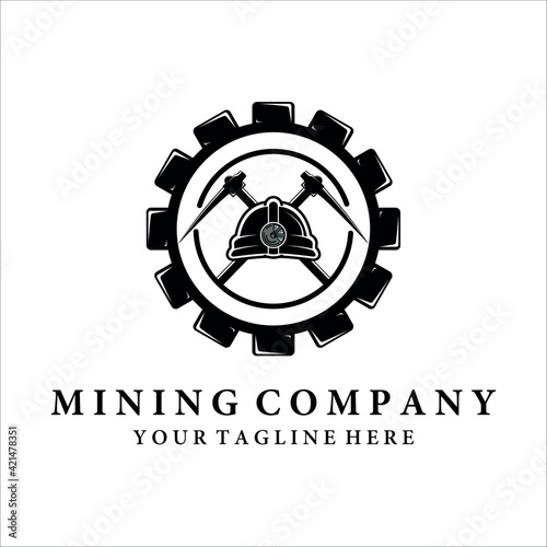 mining logo vector vintage illustration design. gear helmet pickax or pickaxe logo concept illustration design. equipment logo design for professional miner