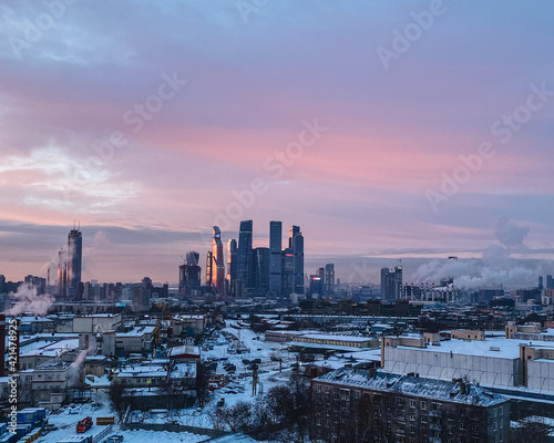 sunset over the city © pavelkor