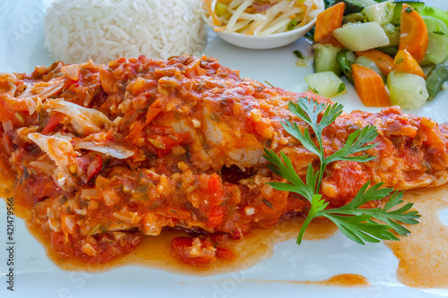 Fototapeta Naklejka Na Ścianę i Meble -  Poisson cuisiné à la créole, gastronomie réunionnaise 