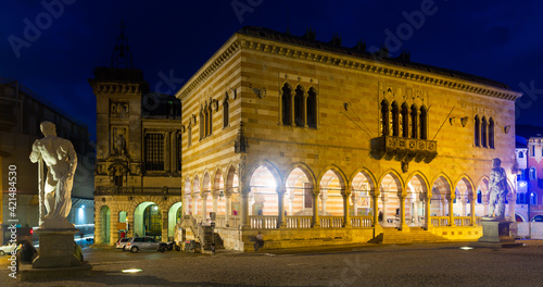 View of lighted Gothic building of Loggia del Lionello - town hall of Udine on central city square of Piazza liberta, Italy © JackF