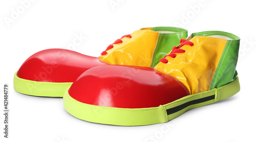Pair of clown shoes isolated on white
