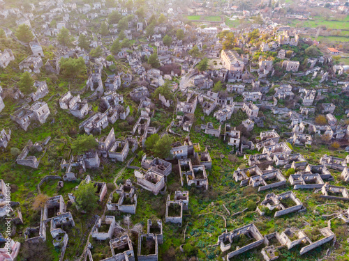 Aerial view of ancient Greek ruined Kayakoy village, preserved as museum village and ghost settlement in Mugla Province of Turkey photo