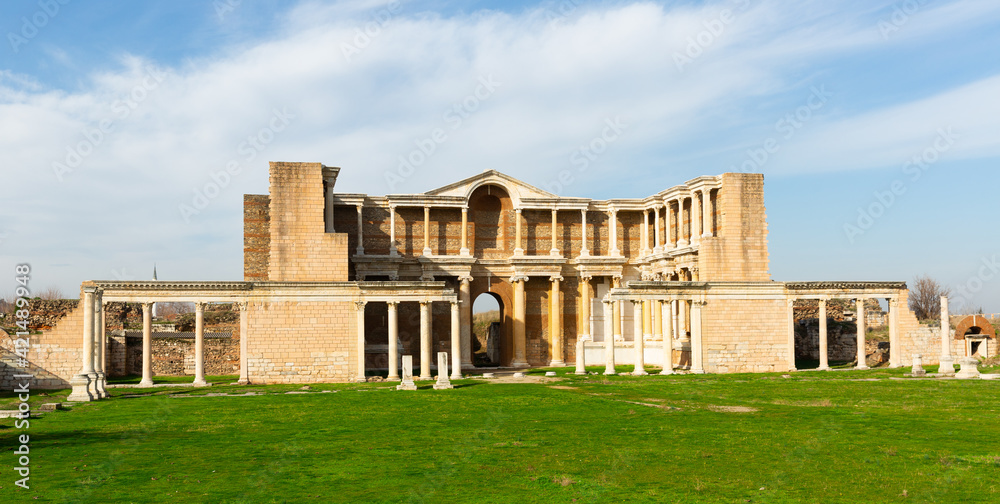 View of notable ruins of Roman bath-gymnasium complex in ancient Sardis city in sunny winter day, Turkey