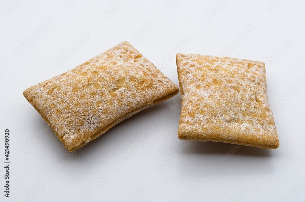 Fototapeta premium Bread crackers isolated on white background. Delicious snack studio shot