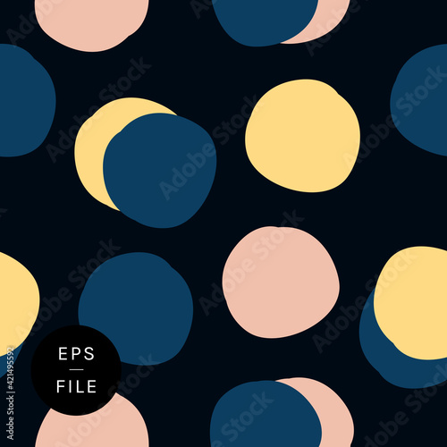 Stylish hand drawn polka dots polka dot bold seamless pattern vector. Quirky elegant round shapes circles soft pink eggnog yellow navy blue. Flamboyant timeless classic. Gift wrapping paper wallpaper