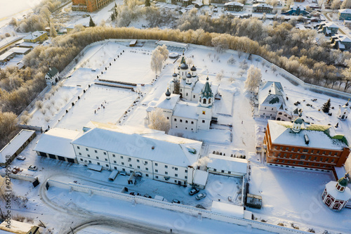 Aerial panoramic view of architectural ensemble of Spaso-Preobrazhensky Monastery in Russian town of Murom on sunny winter day photo