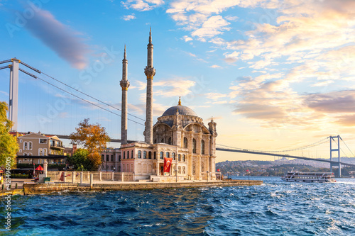 The Bosphorus Bridge and the Ortakoy Mosque at sunset, Istanbul photo