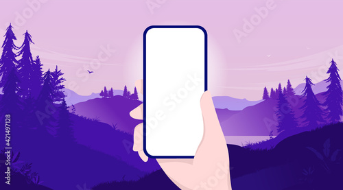 Mockup of hand holding phone with blank screen and landscape background. Template for you own app design. Vector illustration.
