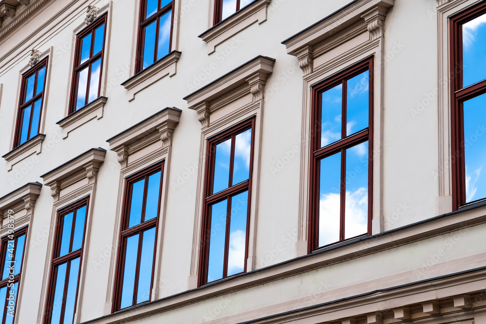 Reflection Of Blue Sky In Glass Windows Of Historic Building In Vienna