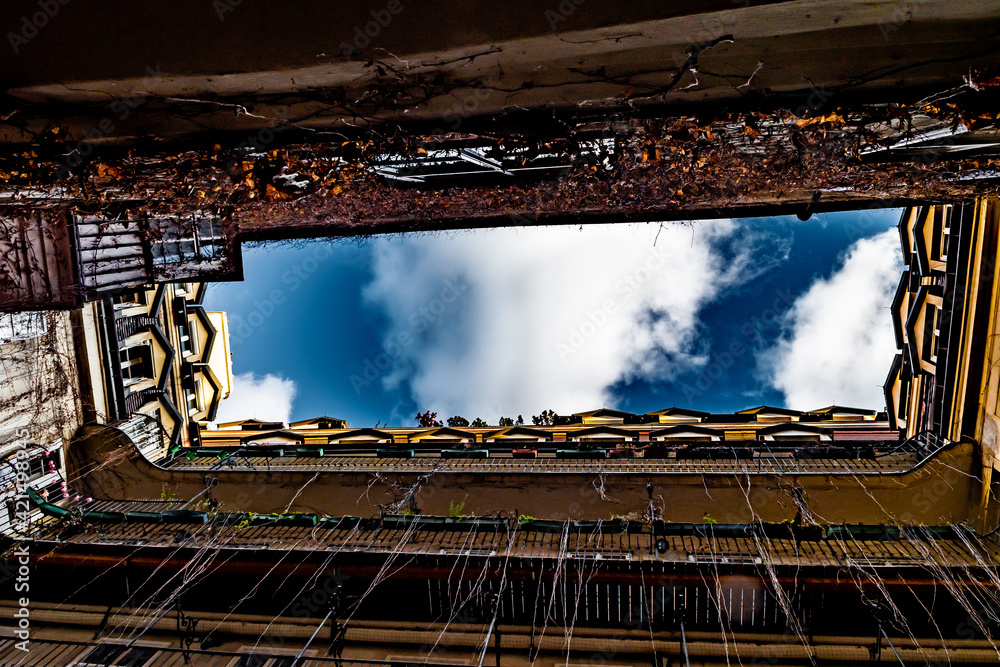 Naklejka premium View Up Inner Courtyard With Balconies In The City Of Vienna In Austria 