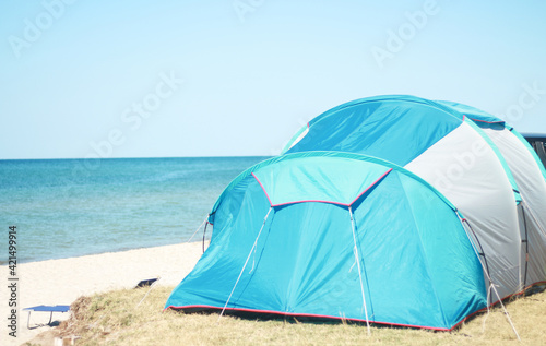 Blue tent the sea coast Copy space