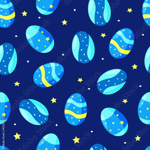 Seamless pattern of Easter eggs, bright colorful vector illustration on a blue background. © Elenglush