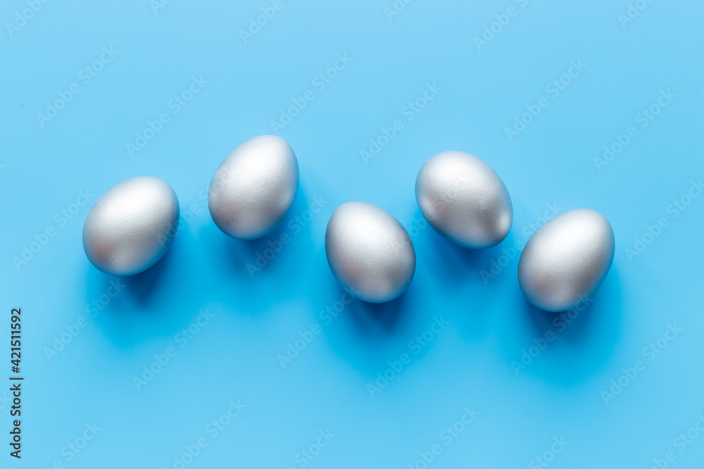 Silver Easter eggs. Easter decoration, top view