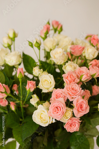 Bouquet of small pink and cream roses