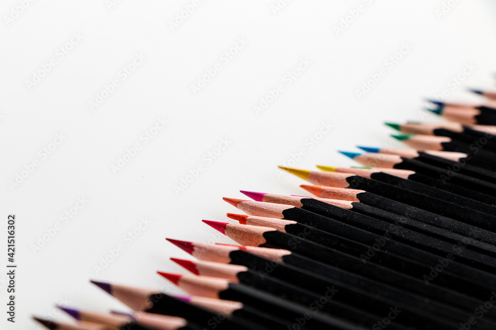 Collection of multicolored pencils on a white background. Collection of multicolored pencils on a white background.