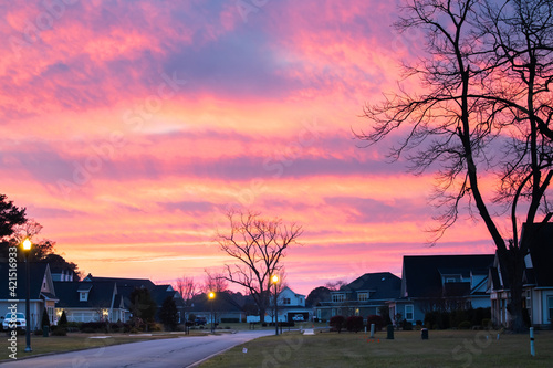 New construction beighborhood at sunset with a purple orange sky. photo