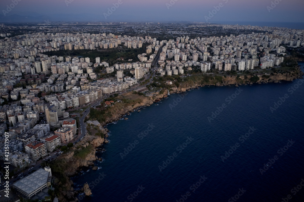 Aerial panoramic view of Mediterranean sea and resort town.