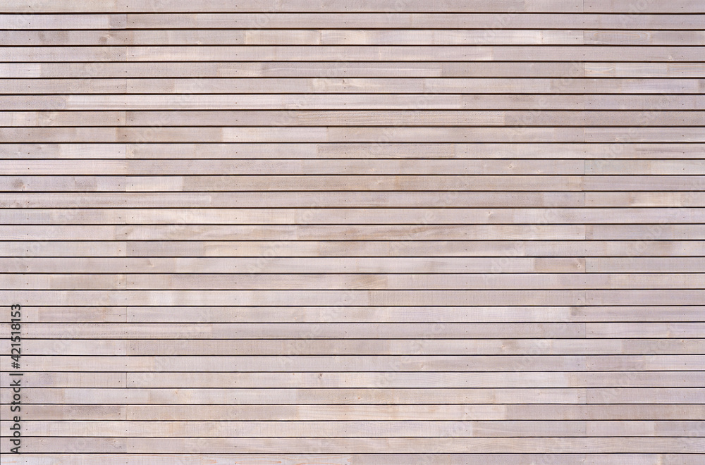 Neue helle Holzwand aus horizontalen Latten mit kleinen Schrauben - Holz Hintergrund Neue helle Holzwand aus horizontalen Latten mit kleinen Schrauben - Holz Hintergrund