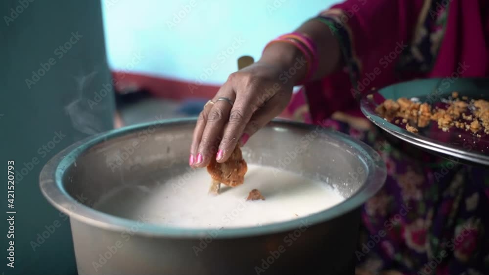 Making kheer on stove in Rural area before chhath puja Making kheer on stove in Rural area before chhath puja