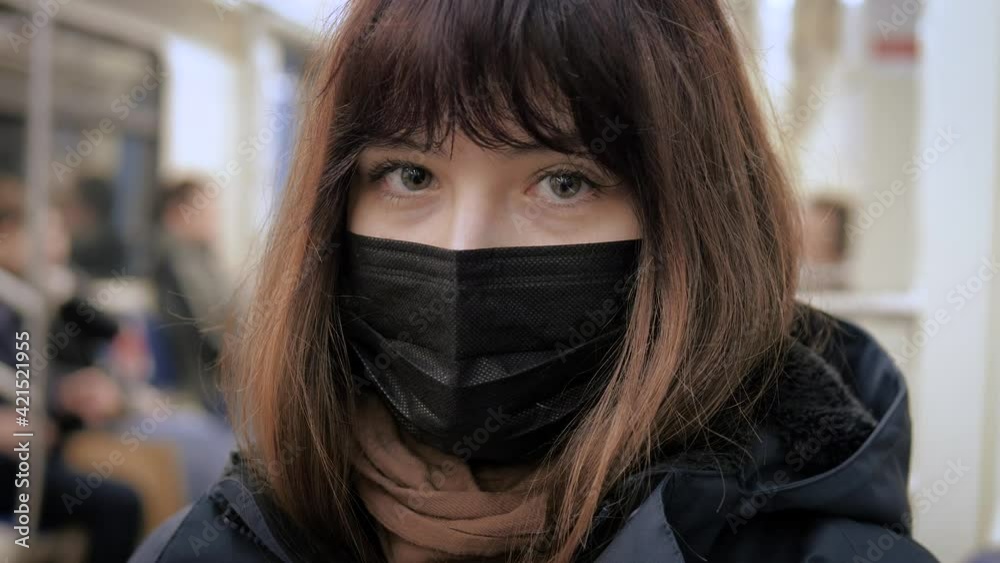 Portrait Sad Woman In Antivirus Mask On Face In Subway Wagon Public Transport Portrait Sad Woman In Antivirus Mask On Face In Subway Wagon Public Transport