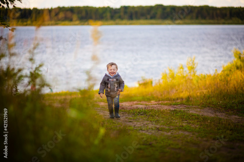 a three-year-old boy on a nature flight, selective focus