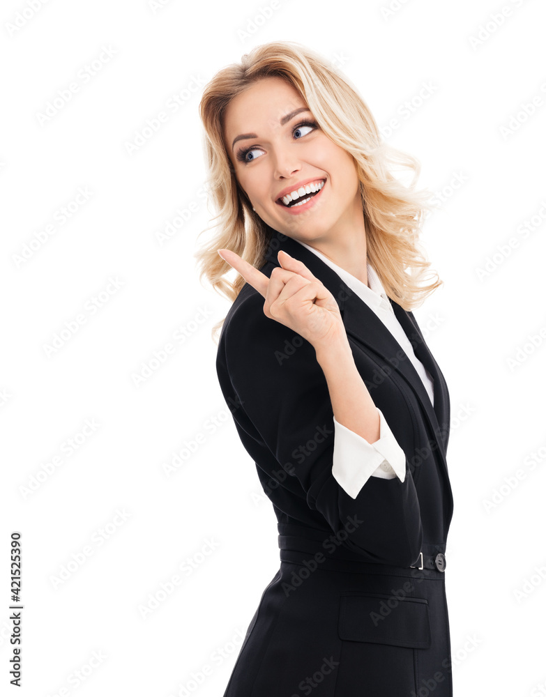 Happy smiling young businesswoman, showing something or blank copy space area, isolated over white background. Portrait of pointing business woman at studio. Happy smiling young businesswoman, showing something or blank copy space area, isolated over white background. Portrait of pointing business woman at studio.