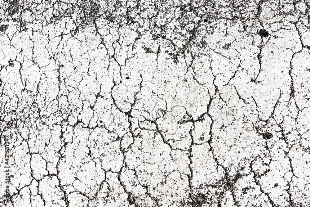 Black cracks background. Scratched lines texture. White and black distressed grunge pattern. Peel paint crack. Weathered rustic surface. Dry paint overlay. Cracked asphalt backdrop. Black cracks background. Scratched lines texture. White and black distressed grunge pattern. Peel paint crack. Weathered rustic surface. Dry paint overlay. Cracked asphalt backdrop.