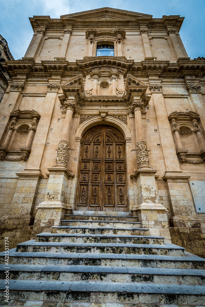 Portal of St Francis of Assisi church in historic part of Noto city, Sicily in Italy