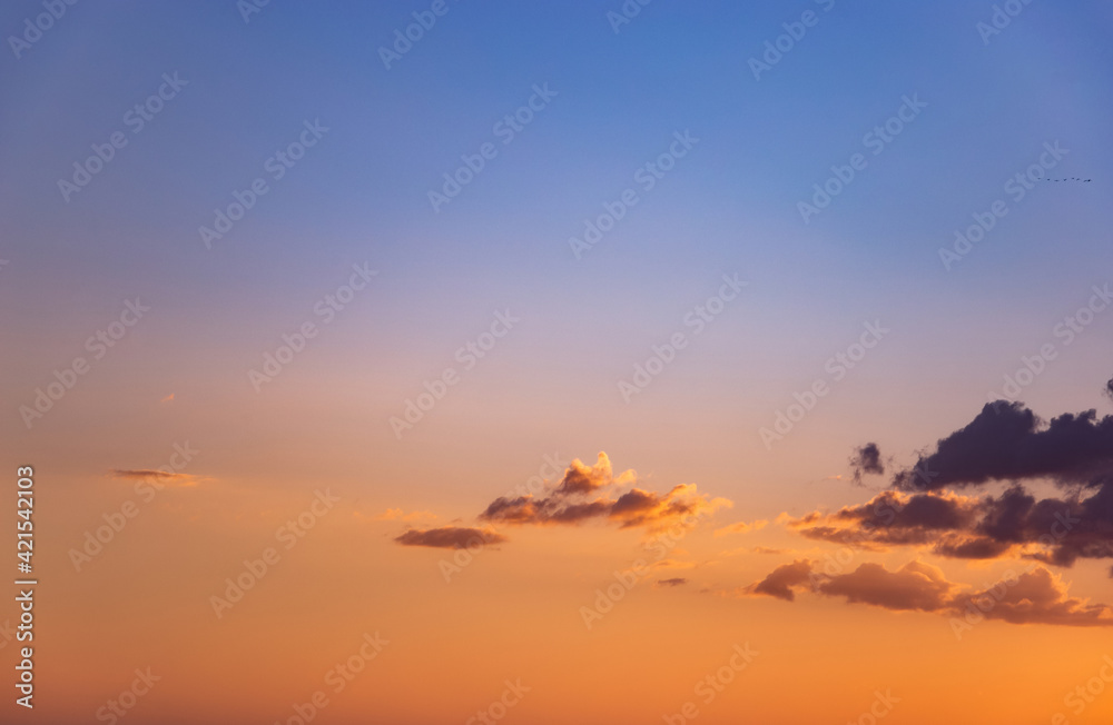 Colorful cloudy sky at sunset. Sky texture, nature background. Colorful cloudy sky at sunset. Sky texture, nature background.