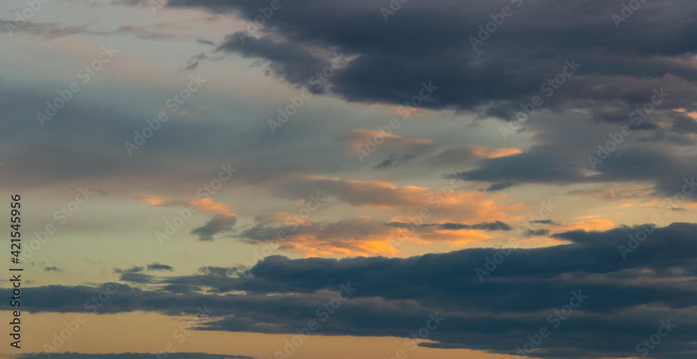 Fototapeta premium Sunset sky with dramatic clouds. Natural background.