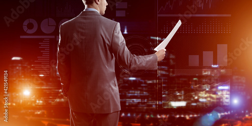 Digital background with infographs and man extending papers or contract