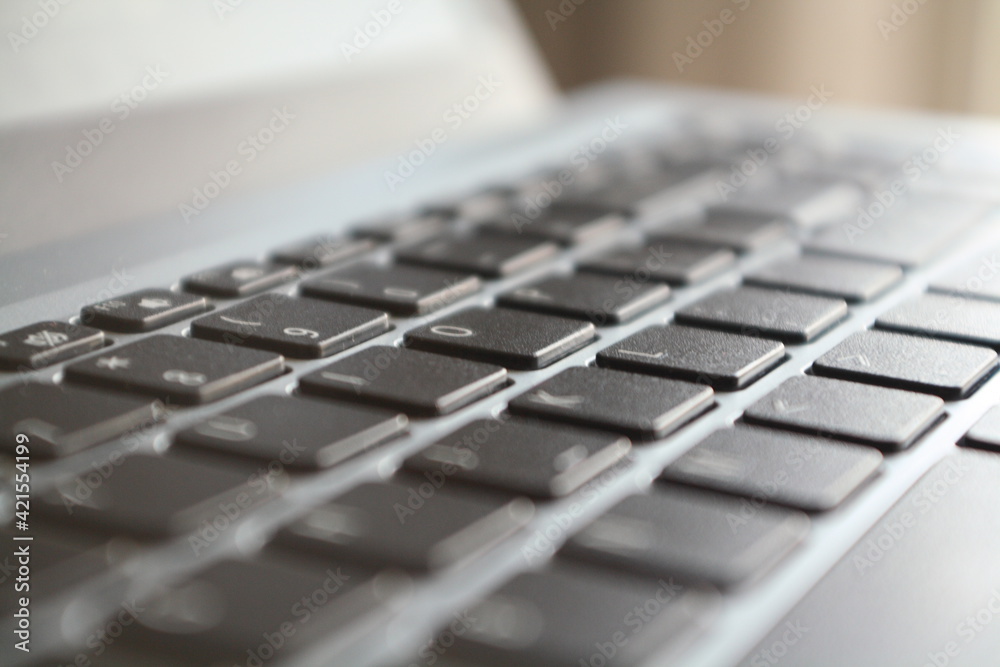 Close-up of a laptop keyboard. Selective focus.